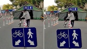 Người đàn ông hiểu nhầm bảng chỉ dẫn xe đạp và người đi bộ