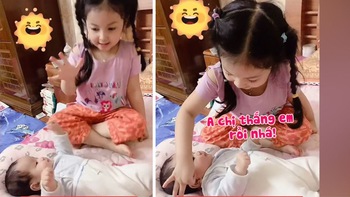 Bé trai bị chị búng tai hoài khi chơi oẳn tù tì