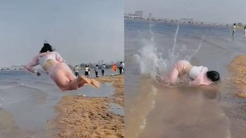 Cô gái quê một cục khi trổ tài lộn santo ngoài bãi biển