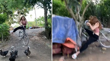 Cô gái đi xe đạp mất phanh lao dốc tông vào gốc cây