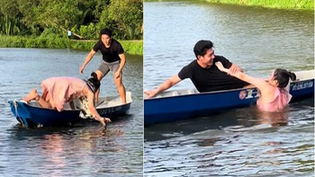 Cô gái chèo thuyền bị chàng trai chơi khăm ngã nhào xuống hồ