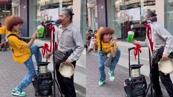 Nghệ sĩ đường phố vừa biểu diễn vừa sợ thanh niên thó mất tiền