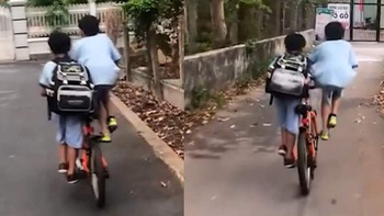 Hai bé trai có pha xử lý 'nghệ cả củ' khi xe đạp có một yên