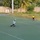 Chàng trai đá penalty sút bay cỏ sân nhân tạo